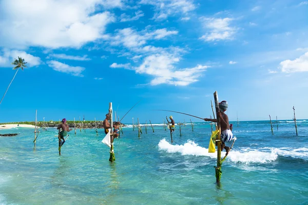 depositphotos_39142321-stock-photo-sri-lankan-traditional-stilt-fisherman