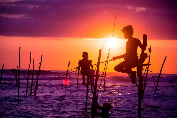 depositphotos_42314557-stock-photo-sri-lankan-traditional-stilt-fisherman